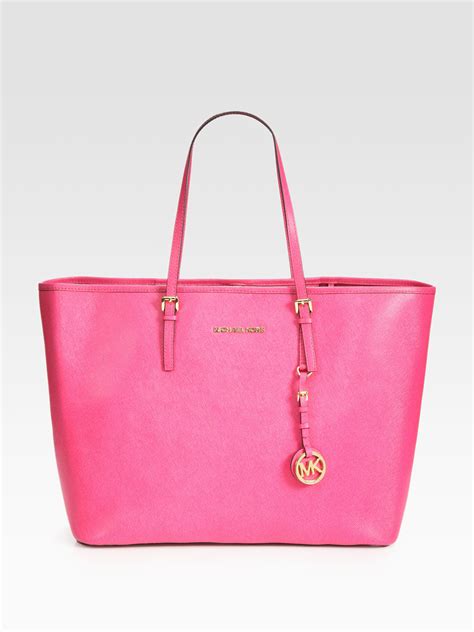 michael kors hot pink bag.